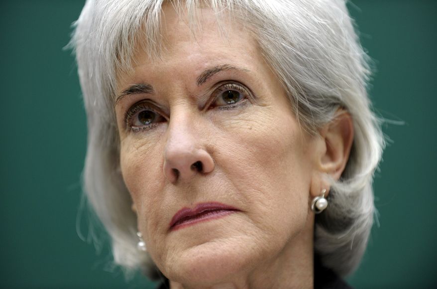 Health and Human Services Secretary Kathleen Sebelius listens as she testifies on Capitol Hill in Washington, Wednesday, Dec. 11, 2013, before the House Energy and Commerce Committee hearing on the implementation failures of the Affordable Care Act. Playing catch-up with a long way to go, President Barack Obama's new health insurance markets last month picked up the dismal pace of signups, the administration reported Wednesday. (AP Photo/Susan Walsh)
