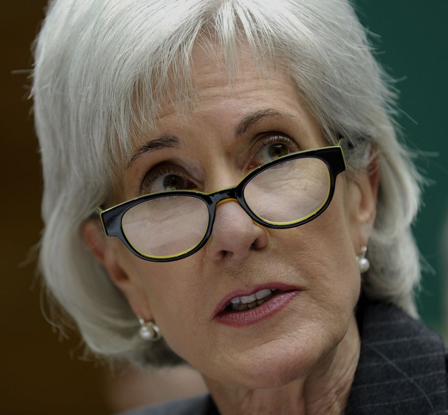 Health and Human Services Secretary Kathleen Sebelius testifies on Capitol Hill in Washington, Wednesday, Dec. 11, 2013, before the House Energy and Commerce Committee hearing on the implementation failures of the Affordable Care Act. Playing catch-up with a long way to go, President Barack Obama's new health insurance markets last month picked up the dismal pace of signups, the administration reported Wednesday. (AP Photo/Susan Walsh)