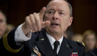 National Security Agency (NSA) Director Gen. Keith Alexander testifies on Capitol Hill in Washington, Wednesday, Dec. 11, 2013, before the Senate Judiciary Committee hearing on &quot;Continued Oversight of U.S. Government Surveillance Authorities&quot; .      (AP Photo/Manuel Balce Ceneta)