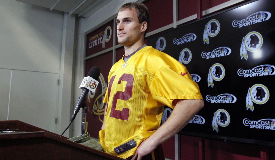 Washington Redskins quarterback Kirk Cousins pauses before speaking at a media availability at their NFL football training facility, Wednesday, Dec. 11, 2013, in Ashburn, Va. Cousins will start for the Redskins on Sunday, and Robert Griffin III will be the No. 3 quarterback behind Rex Grossman. (AP Photo/Alex Brandon)