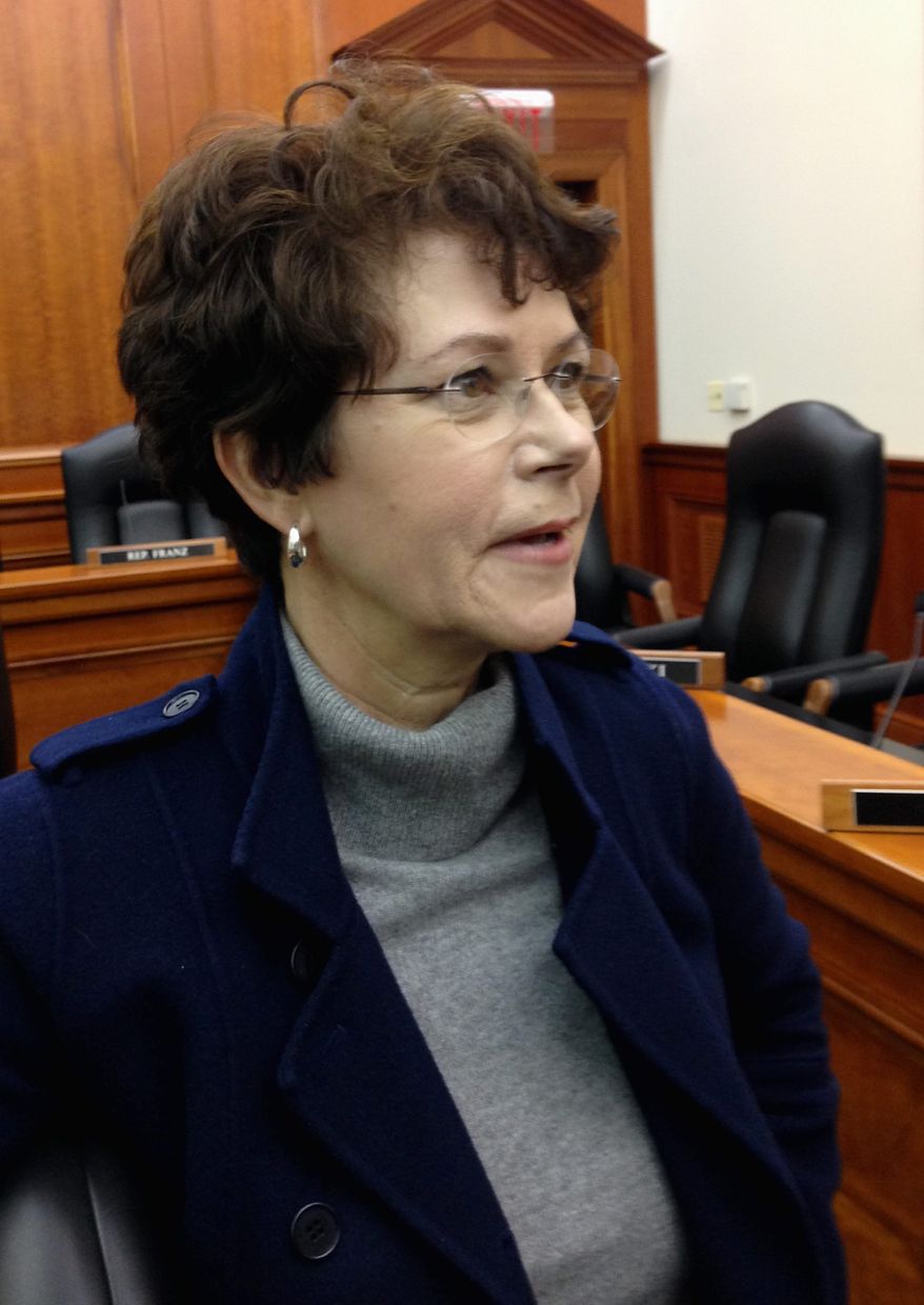 State Rep. Amanda Price, Republican, defended the measure requiring women to purchase an insurance rider that covers abortions saying that "abortion is an individual choice." (ASSOCIATED PRESS PHOTOGRAPHS)