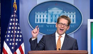 All in a day&#x27;s work: White House press secretary Jay Carney praises former President George W. Bush&#x27;s paintings (&quot;I think the results are pretty impressive&quot;) and wrangles with skeptical press over transparency issues. (Associated Press)