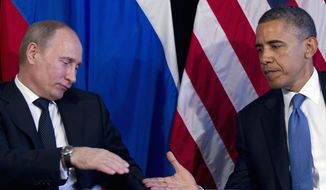 President Obama and Russian President Vladimir Putin (Associated Press) ** FILE **