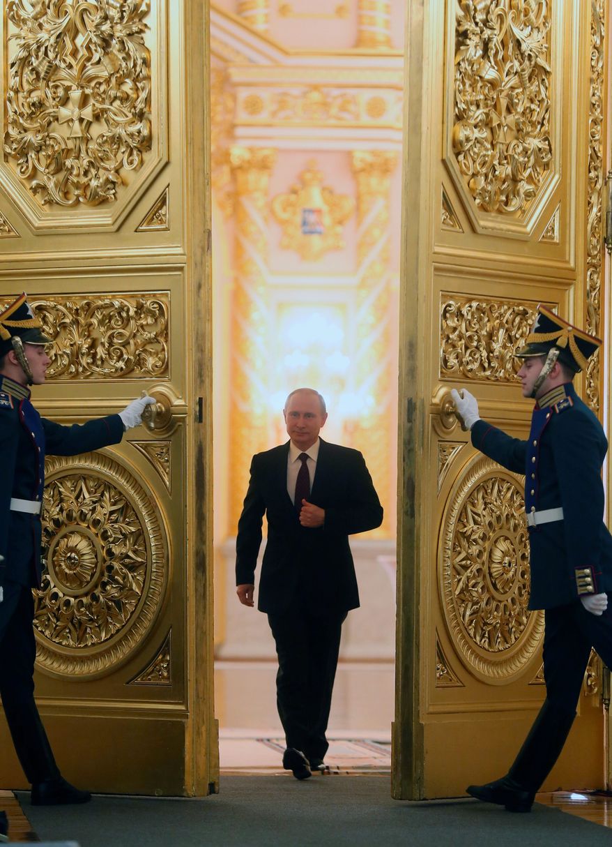 PUTIN'S POWER PLAY: Russian President Vladimir Putin, delivering his annual state of the nation address, lodges veiled insults at the U.S. as Moscow tries to retain power over former Soviet states. (Associated Press)