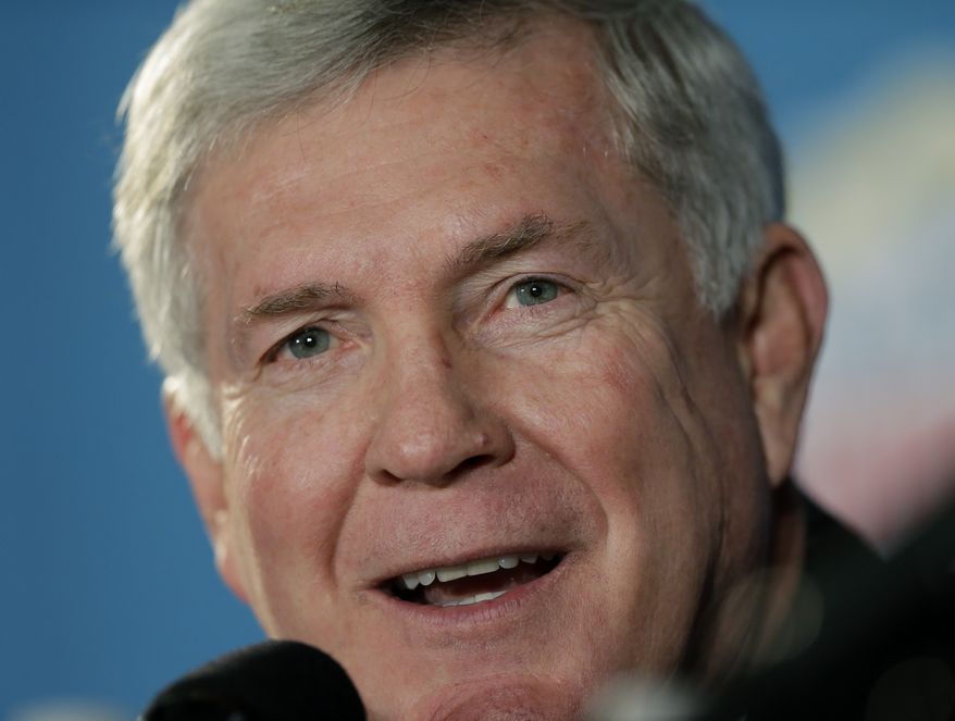 Texas coach Mack Brown responds to a question during a Valero Alamo Bowl NCAA college football news conference, Thursday, Dec. 12, 2013, in San Antonio. Texas and Oregon will play Dec. 30. (AP Photo/Eric Gay)