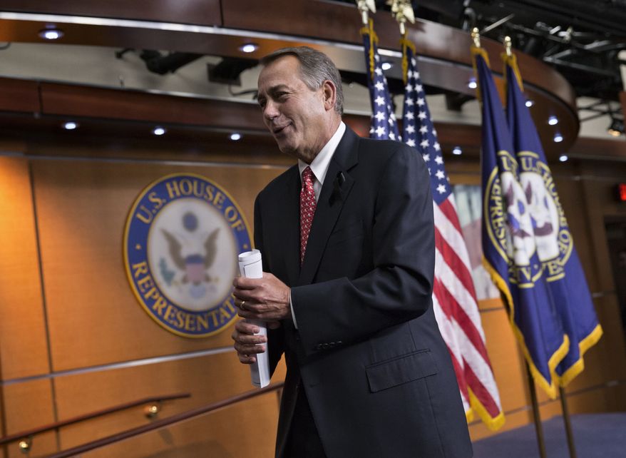 House Speaker John Boehner of Ohio leaves a news conference on Capitol Hill in Washington, Thursday, Dec. 12, 2013, where he vehemently rebuked conservative groups who oppose the pending bipartisan budget compromise struck by House Budget Committee Chairman Rep. Paul Ryan, R-Wis., and Senate Budget Committee Chair Sen. Patty Murray, D-Wash. Boehner said the GOP leadership has had enough tea party-driven intransigence in Congress and he doesn’t care what they think. (AP Photo/J. Scott Applewhite)