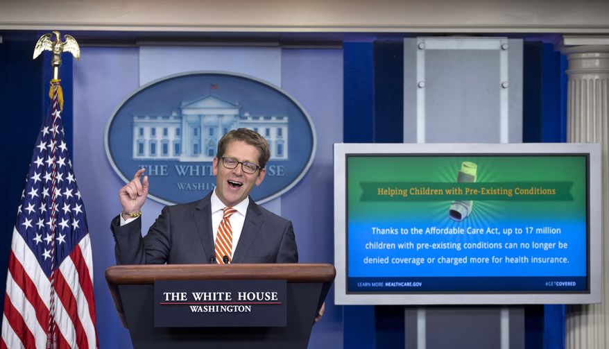 White House press secretary Jay Carney gestures as he speaks during his daily news briefing at the White House in Washington, Thursday, Dec. 12, 2013. Carney spoke about preexisting conditions as it pertains to the Affordable care act, unemployment benefits, and other topics. (AP Photo/Carolyn Kaster)