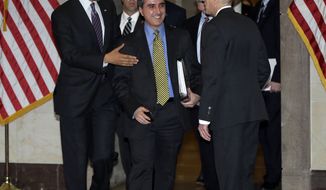**FILE** President Obama (left), and his director of legislative affairs, Miguel Rodriguez (center), are greeted by the House Sergeant Arms Paul Irving after being escorted by escorted by Senate Sergeant at Arms Terry Gainer, on Capitol Hill to meet with House Democratic Caucus in Washington, on March 14, 2013. (Associated Press)