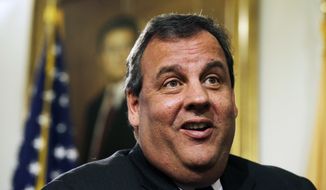 ** FILE ** New Jersey Gov. Chris Christie smiles as he listens to a question in Trenton, N.J., Friday, Dec. 13, 2013, after he announced that Deborah Gramiccioni would replace Bill Baroni as executive deputy director of Port Authority of New York and New Jersey. (AP Photo/Mel Evans)