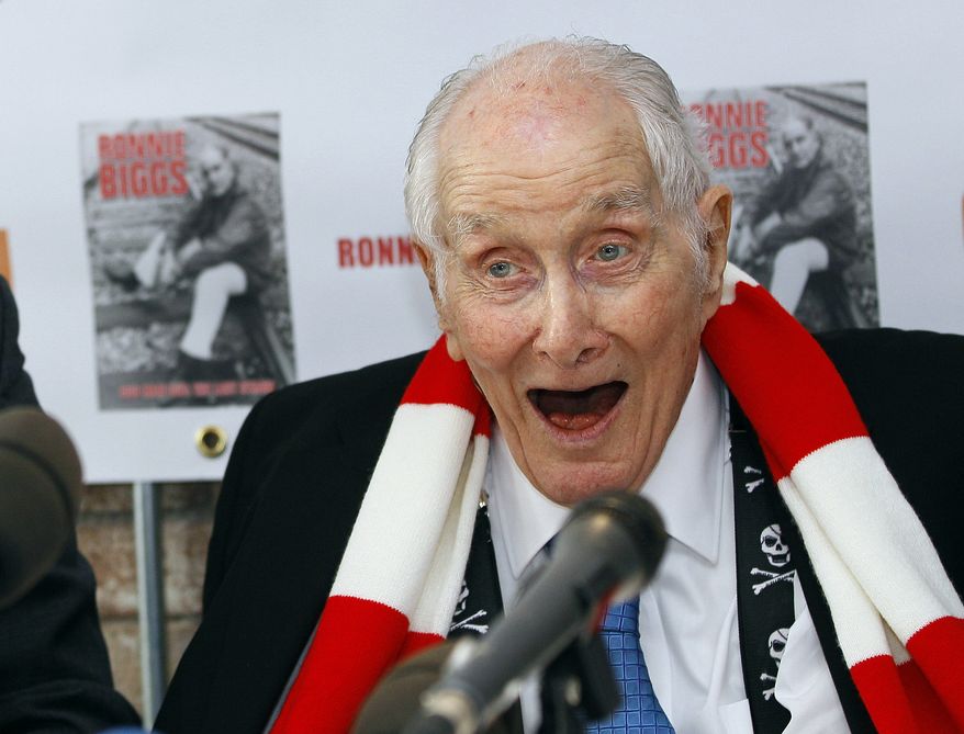 ** FILE ** In this Thursday, Nov. 17, 2011, file photo Ronnie Biggs, one of Britain's most notorious criminals, attends a news conference to mark the release of his autobiography "Odd Man Out: The Last Straw," in London. Biggs died Wednesday, Dec. 18, 2013, his daughter-in-law said. He was 84. (AP Photo/Kirsty Wigglesworth, File)