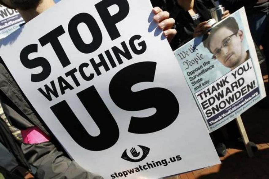 ** FILE ** An anti-spying protest takes place in the nation's capital on Oct. 26, 2013. (Jose Luis Magana / AP)