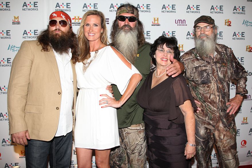 In this May 9, 2012 photo, from left, Willie Robertson, Korie Robertson, Phil Robertson, Miss Kay Robertson and Si Robertson pose at the A&E Networks 2012 Upfront at Lincoln Center in New York. The Robertsons star in the A&E reality series "Duck Dynasty." (AP Photo/Starpix, Kristina Bumphrey)