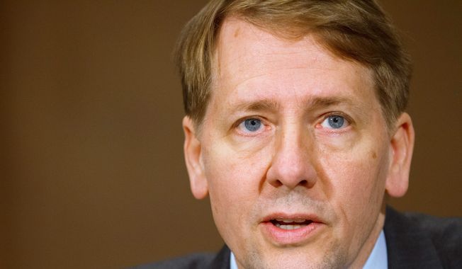 Richard Cordray, director of the Consumer Financial Protection Bureau, has been asked about the method to determine whether an auto creditor&#x27;s portfolio shows &quot;disparate impact&quot; on minorities. (Associated Press)