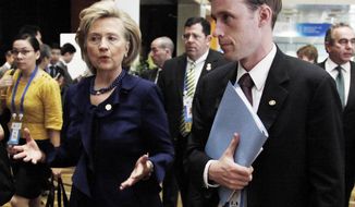 ** FILE ** This Nov. 11, 2009, file photo shows then-Secretary of State Hillary Rodham Clinton walking with a then-Deputy Chief of Staff Jake Sullivan in Singapore. Last summer, Sullivan was traveling with his boss, Hillary Rodham Clinton, when he suddenly disappeared during a stop in Paris. He showed up again a few days later, rejoining Clinton&#39;s traveling contingent in Mongolia. (AP Photo/Ng Han Guan, File)