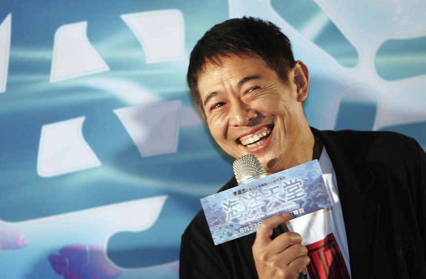 FILE - In this Monday, Aug. 23, 2010 file photo, Chinese actor Jet Li smiles during a press event for announcing his new movie "Ocean Heaven," in Taipei, Taiwan. Li said he’s being treated for an overactive thyroid, but he’s determined to fight the condition head-on. (AP Photo/Chiang Ying-ying, File)