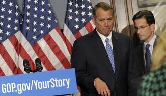 ** FILE ** In this Oct. 23, 2013, file photo House Speaker John Boehner of Ohio, left, and House Majority Leader Eric Canton of Va., right, leave after a news conference on Capitol Hill in Washington. (AP Photo/Susan Walsh, File)