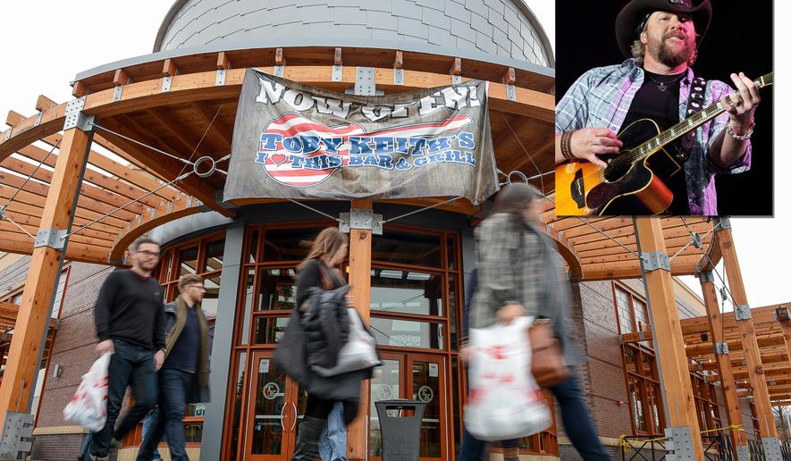 Signs reading &quot;no guns permitted&quot; have been displayed on the front doors to Toby Keith&#39;s I Love this Bar &amp; Grill, Woodbridge, Va. (Andrew Harnik/The Washington Times)