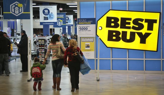 ** FILE ** In this Nov. 23, 2013, file photo, shoppers enter a Best Buy in New York. In 2013, (AP Photo/Bebeto Matthews, File)