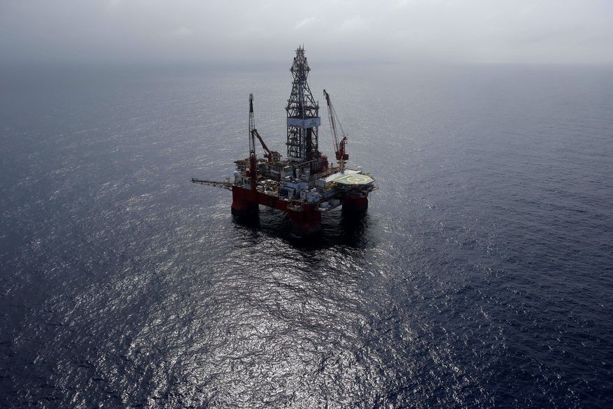 The Centenario deep-water drilling platform stands off the coast of Veracruz, Mexico in the Gulf of Mexico, Friday, Nov. 22, 2013. The administration of Mexico's President Enrique Pena Nieto is pushing for an energy reform that will increase private investment in state-owned oil company Pemex and Mexicos oil industry as traditional easy oil reserves dry up, forcing the country to explore deep water and shale oil that are more expensive and complicated to extract. (AP Photo/Dario Lopez-Mills)