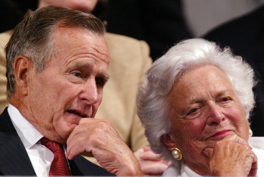 Former President George H.W. Bush and former first lady Barbara Bush listen as, President Bush, accepts the party nomination at the Republican National Convention Thursday, Sept.2, 2004, in New York. (AP Photo/Paul Sancya)