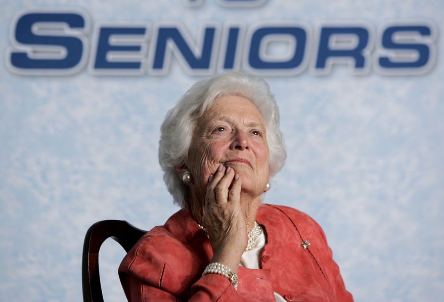 Former first lady Barbara Bush listens to her son, President Bush, as he advances his Social Security reform proposals before a hand-picked audience at the Lake Nona YMCA Family Center in Orlando, Fla., Friday, March 18, 2005. In a state with a large population of retirees, Bush wants to assure seniors that they will continue to receive their regular government checks, while he pushes for a system of private accounts which would enable younger workers to divert a portion of their payroll taxes from Social Security deductions and into stock market investments to bankroll their retirement. (AP Photo/J. Scott Applewhite)
