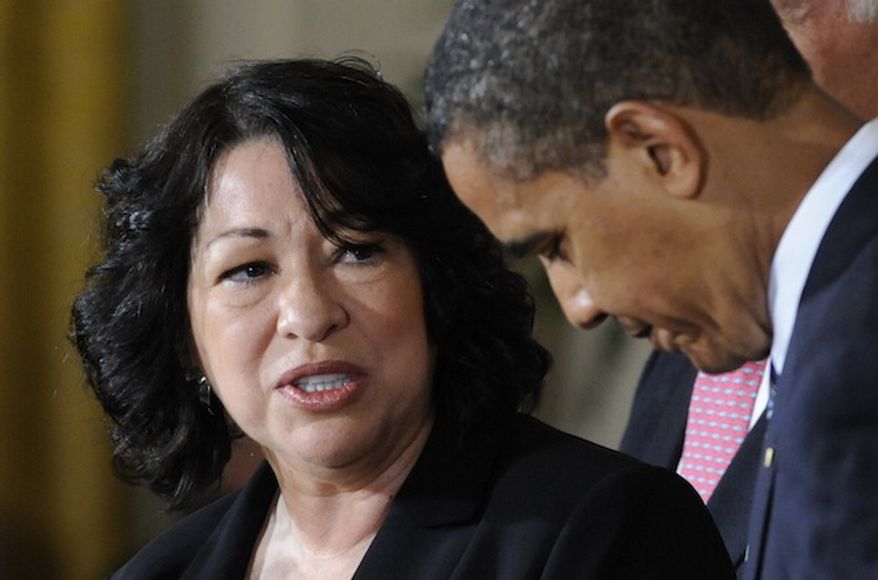 **FILE** Supreme Court choice Sonia Sotomayor speaks to President Obama during an announcement on May 26, 2009, in the East Room of the White House. (Associated Press)