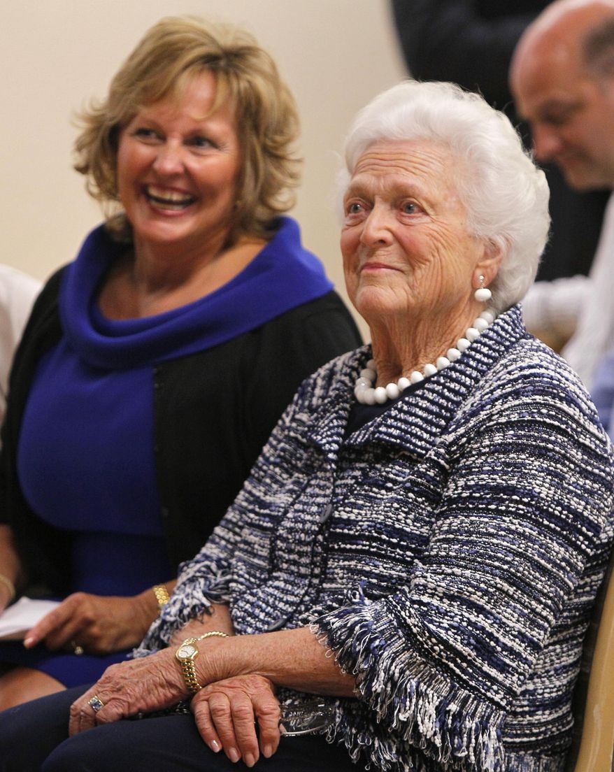 Former first lady Barbara Bush, right, and Maine's first lady Anne LePage listen to remarks at ceremony for Literacy Maine, Wednesday, June 15, 2011, in Biddeford, Maine. The Barbara Bush Foundation for Family Literacy awarded grants to provide quality family literacy programming. As of June 2011, the Foundation has awarded over $40 million to 902 family literacy programs. (AP Photo/Robert F. Bukaty)