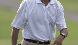 ** FILE ** President Obama smiles as he walks from 18th green at Mid-Pacific County Club in Kailua, Hawaii, Wednesday, Jan. 1, 2014.  (AP Photo/Carolyn Kaster)