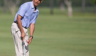 R&amp;R: President Obama gives rare access to a media pool Thursday as he plays his seventh round of golf during his Hawaiian vacation. The first family also has taken two hikes, two beach trips and one snorkeling adventure, but has not attended church, even for Christmas. (Associated Press photographs)