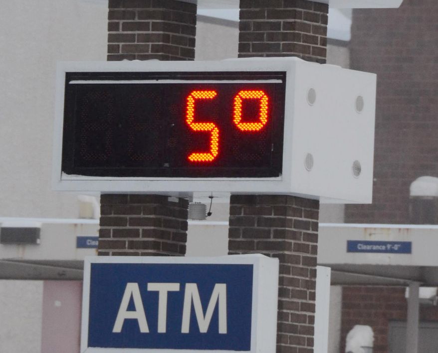 A bank thermometer reads in the single digits on Friday, Jan. 3, 2014, in Hazleton, Pa. Northern and eastern Pennsylvania saw 6 to 8 inches of snow, while southern and western Pennsylvania saw 2 to 5 inches, the National Weather Service said. (AP Photo/Hazleton Standard-Speaker, Eric Conover)