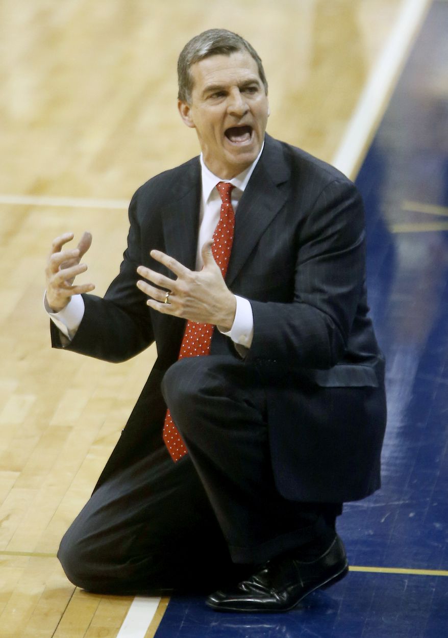 Maryland head coach Mark Turgeon kneels on the court in the second half of an NCAA college basketball game against Pittsburgh on Monday, Jan. 6, 2014, in Pittsburgh. Pittsburgh won 79-59.(AP Photo/Keith Srakocic)