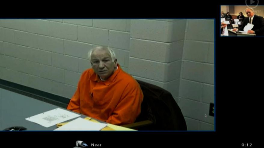 This video framegrab provided by the courthouse pool via Commonwealth Media Services shows Jerry Sandusky describing his career and retirement from Penn State by video link from Greene State Prison in southwestern Pennsylvania, Tuesday, Jan. 7, 2014, as testimony began in a hearing into whether he can get back the retirement benefits he lost after being convicted of child molestation. (AP Photo/Commonwealth Media Services)