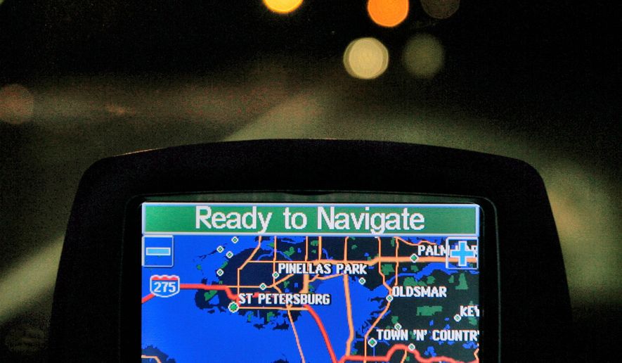 A Garmin GPS unit is shown inside a vehicle in Tampa, Fla. &quot;Currently, no comprehensive federal privacy law governs the collection, use, and sale of personal information by private-sector companies,&quot; a Government Accountability Office report stated. (Associated Press)