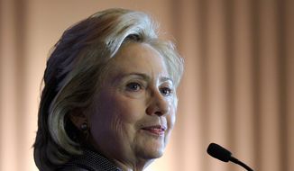 ** FILE ** In this Dec. 6, 2013, file photo, former Secretary of State Hillary Rodham Clinton speaks on Capitol Hill in Washington. (AP Photo/Susan Walsh, File)