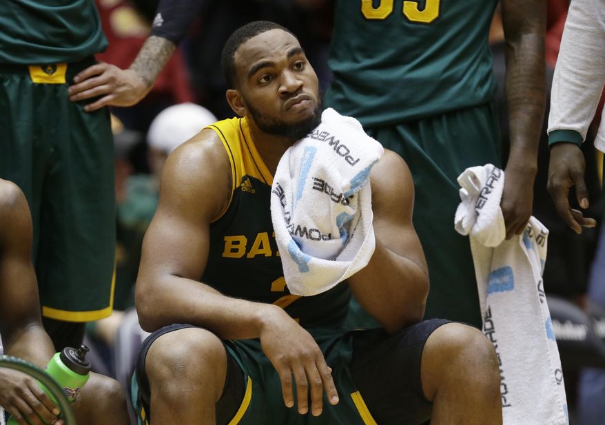 Baylor forward Rico Gathers sits in the huddle during the second half of an NCAA college basketball game against Iowa State, Tuesday, Jan. 7, 2014, in Ames, Iowa. Iowa State won 87-72. (AP Photo/Charlie Neibergall)