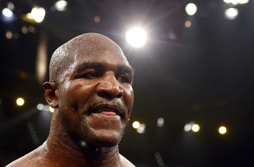 FILE - In this Dec. 20, 2008, file photo, boxer Evander Holyfield, from United States, reacts after losing against Nikolai Valuev, of Russia, in a WBA heavyweight title fight at the Hallenstadion, in Zurich, Switzerland. The former world heavyweight champion has been reprimanded by the bosses of a British reality TV show for saying being gay "ain't normal." The 50-year-old American made the comments during a conversation with a fellow contestant on Celebrity Big Brother in an episode that was aired Sunday, Jan. 5, 2014, in Britain. (AP Photo/Matthias Schrader, File)