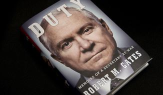 The book titled &quot;Duty: Memoirs of a Secretary of War,&quot; by former Defense Secretary Robert Gates is seen in Washington, Wednesday, Jan. 8, 2014. The White House is bristling over former Defense Secretary Robert Gates&#39; new memoir accusing President Barack Obama of showing too little enthusiasm for the U.S. war mission in Afghanistan and sharply criticizing Vice President Joe Biden&#39;s foreign policy instincts. (AP Photo/Jacquelyn Martin)