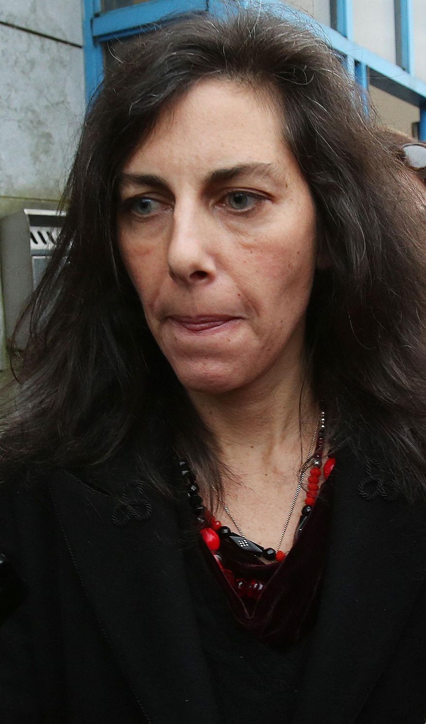 Jenny Lauren, niece of US fashion designer Ralph Lauren, leaves Ennis District Court, Ennis, Ireland, Wednesday Jan. 8, 2014. Lauren appeared in an Irish court on charges of being drunk and disorderly on a New York-bound plane. Jewelry designer Jenny Lauren was arrested after a Delta flight from Barcelona made an unscheduled stop at Shannon Airport on Monday. (AP Photo/PA, Niall Carson) UNITED KINGDOM OUT NO SALES NO ARCHIVE