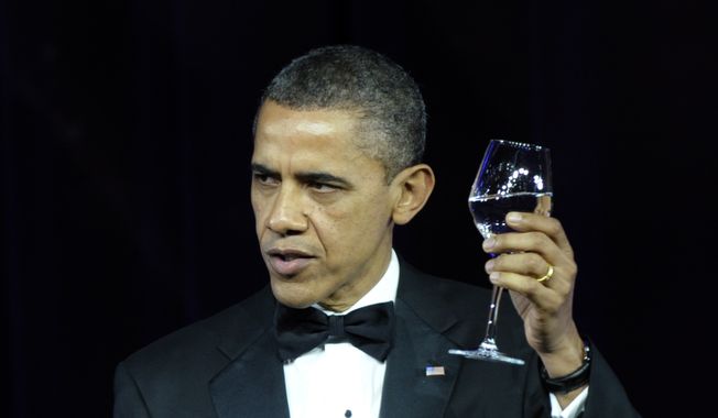 President Barack Obama offers a toast during a State Dinner for British Prime Minister David Cameron during a State Dinner at the White House in Washington, Wednesday, March 14, 2012.  (AP Photo/Susan Walsh)