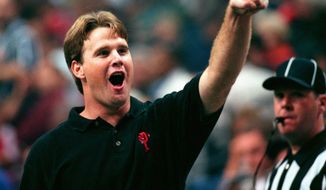 Orlando&#39;s head coach and former Storm quarterback Jay Gruden cheers while pointing up to the Orlando fan section during the closing minutes of an Orlando victory over the Tampa Bay Storm during the Arena Bowl XII at the Ice Palace in Tampa on Sunday (8/23/98). - -Photo By:Dirk Shadd/Tampa Bay Times