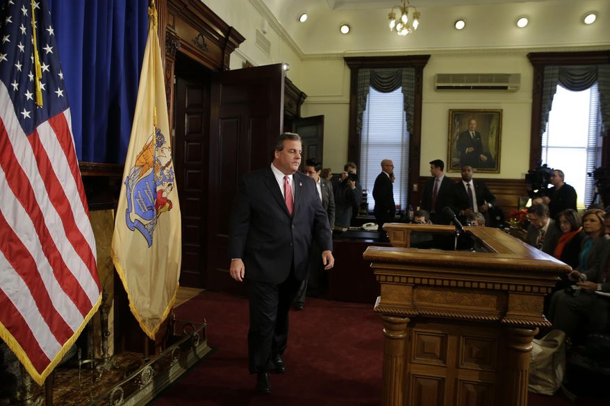 New Jersey Gov. Chris Christie walks to the podium before a news conference Thursday, Jan. 9, 2014, at the Statehouse in Trenton, N.J. Christie has fired a top aide who engineered political payback against a town mayor, saying she lied. Deputy Chief of Staff Bridget Anne Kelly is the latest casualty in a widening scandal that threatens to upend Christie's second term and likely run for president in 2016. Documents show she arranged traffic jams to punish the mayor, who didn't endorse Christie for re-election. (AP Photo/Mel Evans)