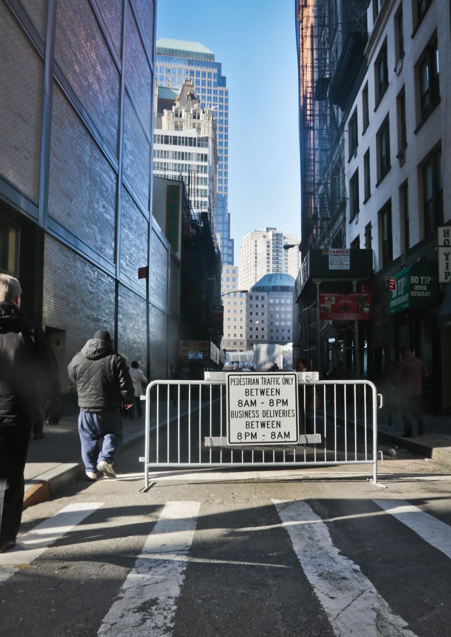 A barricade blocks a multi zone residential and commercial street, permitting limited vehicle access on Thursday, Jan. 9, 2014 in New York. Area residents living in the the shadow of the World Trade center have filed a lawsuit against city plans to build a security perimeter around her neighborhood, they say would permanently restrict street access, create congestion and health hazards, among their concerns. (AP Photo/Bebeto Matthews)