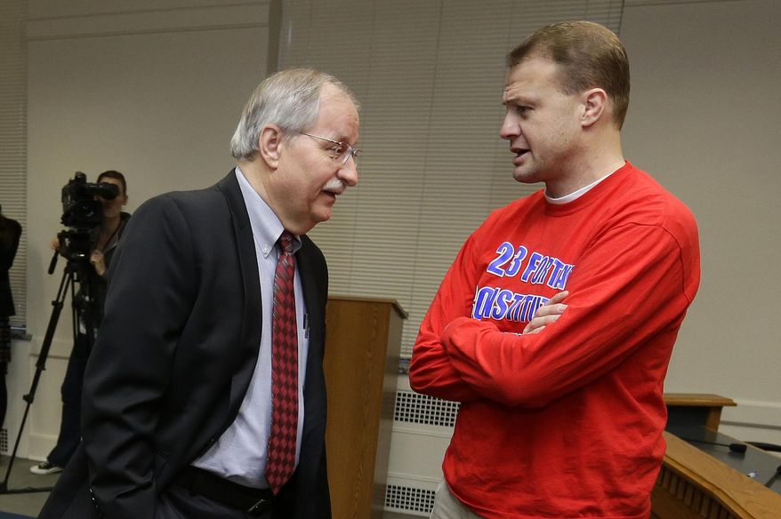 House Speaker Frank Chopp, D-Seattle, left, talks with Tim Eyman, right, who has filed an initiative that would cut sales taxes in 2015 if lawmakers don't pass a constitutional amendment requiring a two-thirds vote on any tax hikes, Thursday, Jan. 9, 2014. The exchange took place before the AP Legislative Preview in Olympia, Wash. (AP Photo/Ted S. Warren)