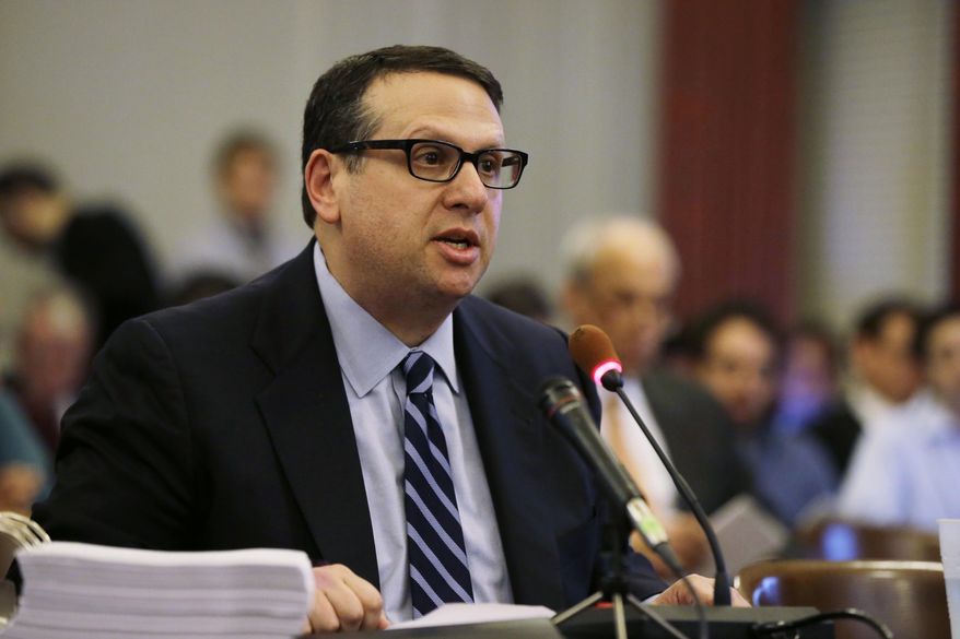 David Wildstein speaks during a hearing Thursday, Jan. 9, 2014, at the Statehouse in Trenton, N.J. Wildstein, a former appointee of Gov. Chris Christie is refusing to answer questions from a legislative committee looking into a scandal involving punitive traffic lane closures. The Christie administration stands accused of closing lanes on the George Washington Bridge, linking New York and New Jersey, in order to create a huge traffic backup as retribution against a local mayor for not endorsing the governor’s reelection. (AP Photo/Mel Evans)