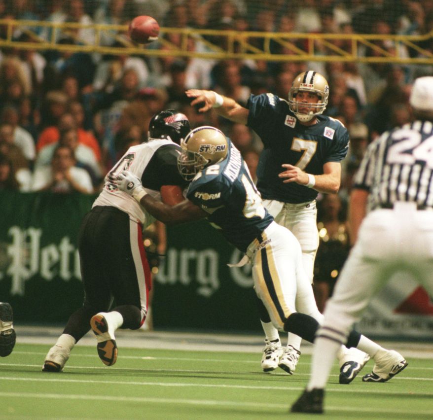 St. Petersburg Tampa Bay Storm vs Orlando Predators. Storm QB #7 Jay Gruden gets off a pass. Photo by: Brian Baer/Tampa Bay Times.