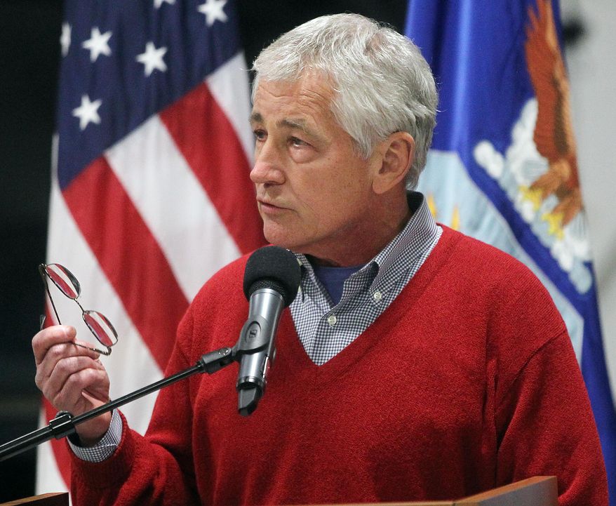 Defense Secretary Chuck Hagel speaks with airmen of the 20th Air Force 90th Missile Wing during a trip to F.E. Warren Air Force Base on Thursday, Jan. 9, 2014, in Cheyenne, Wyo. It was the first time since 1982 that a defense secretary has visited the nuclear missile base. (AP Photo/Wyoming Tribune Eagle, Blaine McCartney)