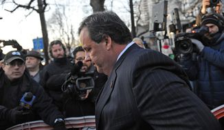 New Jersey Gov. Chris Christie walks past reporters as he leaves City Hall Thursday, Jan. 9, 2014, in Fort Lee, N.J. Christie traveled to Fort Lee to apologize in person to Mayor Mark Sokolich. Moving quickly to contain a widening political scandal, Gov. Chris Christie fired one of his top aides Thursday and apologized repeatedly for the &amp;quot;abject stupidity&amp;quot; of his staff, insisting he had no idea anyone around him had engineered traffic jams to get even with a Democratic mayor. (AP Photo/Louis Lanzano)