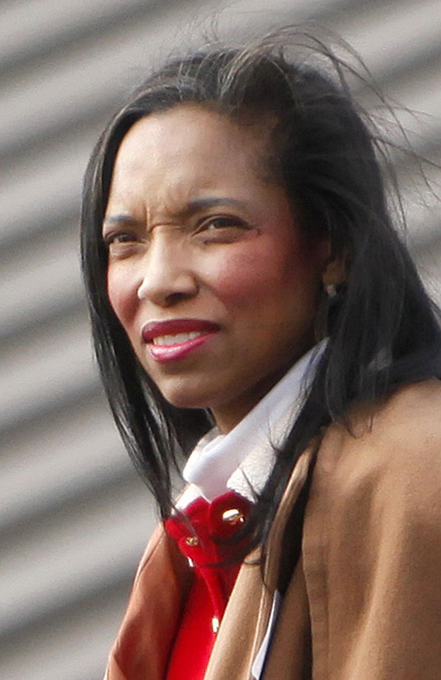 FILE - This Monday, Nov. 11, 2013 file photo shows Hamilton County Judge Tracie Hunter in Blue Ash, Ohio. Hunter, an Ohio juvenile court judge,was indicted Friday, Jan. 10, 2014 on eight felony charges, including tampering with evidence, theft in office and forgery. (AP Photo/The Cincinnati Enquirer, Amanda Rossman, File) MANDATORY CREDIT; NO SALES