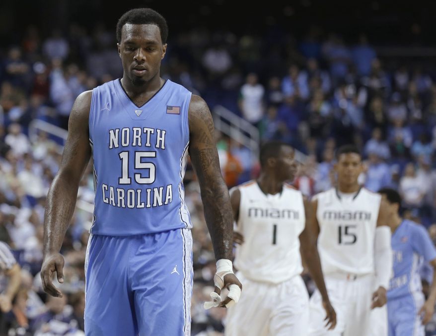 FILE - In this March 17, 2013, file photo, North Carolina's P.J. Hairston (15) walks downcourt during NCAA college basketball game against Miami in the championship of the Atlantic Coast Conference tournament in Greensboro, N.C. Hairston says he will play in the NBA Development League. In a statement, Hairston said he submitted paperwork to play in the league Friday afternoon, Jan. 10, 2014. The Tar Heels' leading scorer never played this season after the school decided last month not to seek his reinstatement for NCAA rules violations.(AP Photo/Gerry Broome, File)