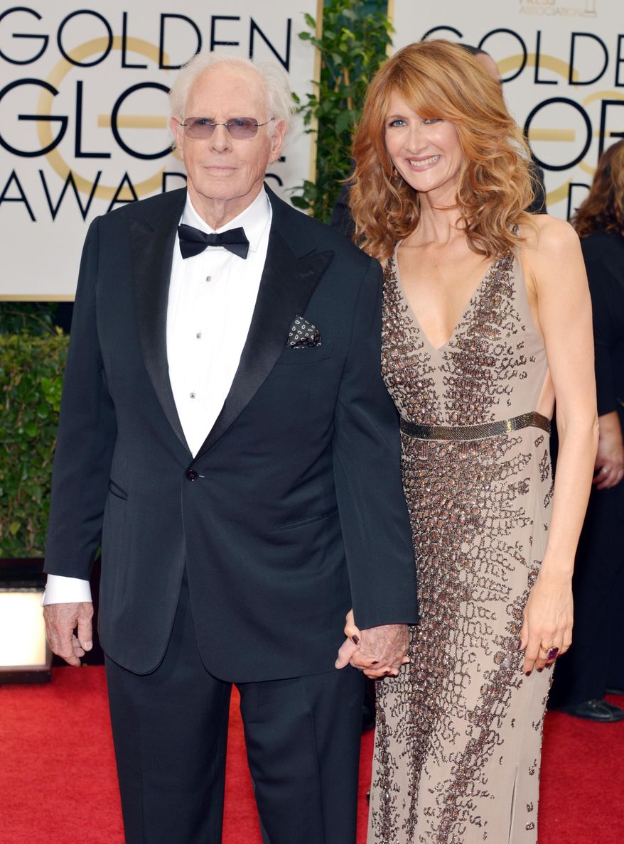 Bruce Dern, left, and Laura Dern arrive at the 71st annual Golden Globe Awards at the Beverly Hilton Hotel on Sunday, Jan. 12, 2014, in Beverly Hills, Calif. (Photo by John Shearer/Invision/AP)